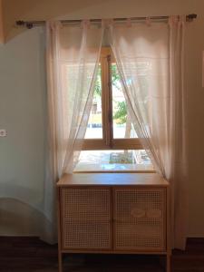 Fotografia z galérie ubytovania Catalina's house -Μικρή εξοχική κατοικία με αυλή & parking v destinácii Xylokastron