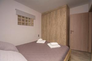 A bed or beds in a room at Anna's Home