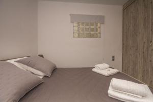 A bed or beds in a room at Anna's Home