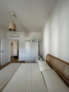 Postel nebo postele na pokoji v ubytování Casa Matilde a pochi passi dal mare