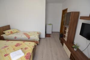 Postel nebo postele na pokoji v ubytování Casa Picu