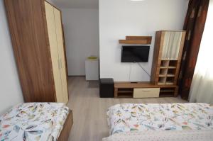 Postel nebo postele na pokoji v ubytování Casa Picu