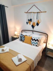 Postel nebo postele na pokoji v ubytování Apartment 94m2, center of Sitia, WiFi, 350m beach