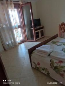 Letto o letti in una camera di Guesthouse Fatos Biti