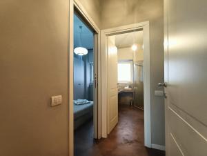 A bed or beds in a room at Residenza Porta Romana