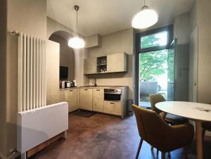 A kitchen or kitchenette at Residenza Porta Romana