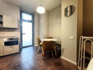 A kitchen or kitchenette at Residenza Porta Romana
