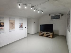 A television and/or entertainment centre at Residenza Porta Romana
