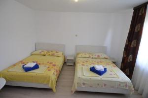 Postel nebo postele na pokoji v ubytování Casa Picu