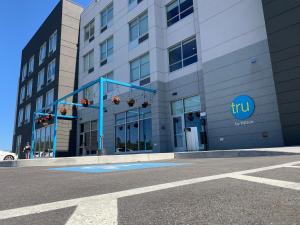 a building with aku sign on the side of it at Tru By Hilton Yarmouth, Ns in Yarmouth