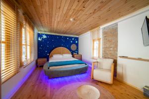 A bed or beds in a room at The Little Prince Boutique Otel