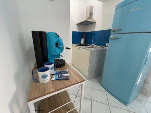 Kuchyň nebo kuchyňský kout v ubytování Blue B&B Ischia