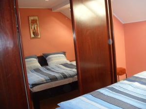 Postel nebo postele na pokoji v ubytování Apartmány Prima