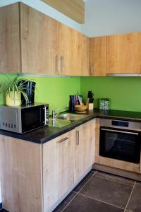 Kuchnia lub aneks kuchenny w obiekcie Apartment Goaßa - Familie Zehner