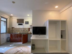 A television and/or entertainment centre at Everrich Boutique Resort Boracay