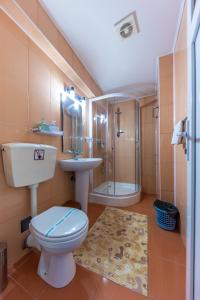 Koupelna v ubytování Hotel Amphitryon