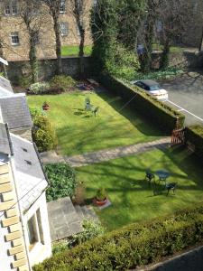 an aerial view of a yard with two picnic tables at Kildonan Lodge Hotel in Edinburgh