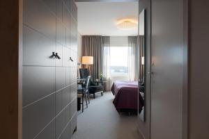 Postel nebo postele na pokoji v ubytování Elite Plaza Örnsköldsvik