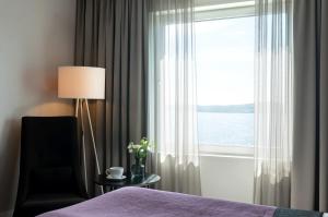 Postel nebo postele na pokoji v ubytování Elite Plaza Örnsköldsvik