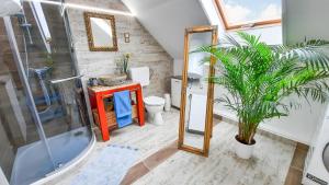Kúpeľňa v ubytovaní AllOne apartman