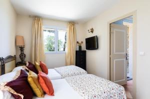 Ένα ή περισσότερα κρεβάτια σε δωμάτιο στο U PIAZZALE