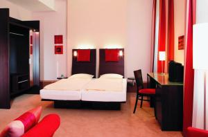 Uma cama ou camas num quarto em Maris Hotel