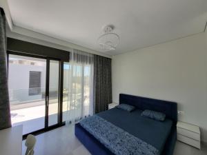 Posteľ alebo postele v izbe v ubytovaní Olea Valley Holiday Villa