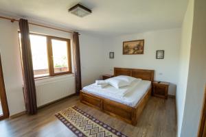 Postel nebo postele na pokoji v ubytování Cabana Denisa + 17 fotografií