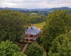 an aerial view of a house in the trees at Red Hill Bed and Breakfast in Lovingston