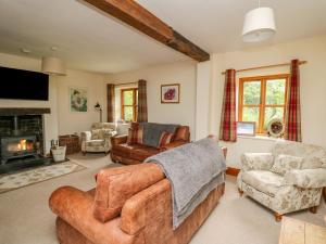 Et opholdsområde på Byrdir Cottage