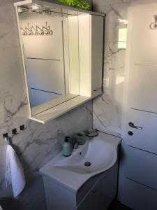 Kúpeľňa v ubytovaní Apartman MIR