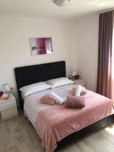 Posteľ alebo postele v izbe v ubytovaní Apartman MIR