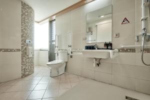Koupelna v ubytování 安蘭居旅店 An Lan Jie Hotel + 37 fotografií