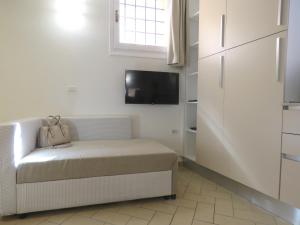 Uma cama ou camas num quarto em Seta Apartment