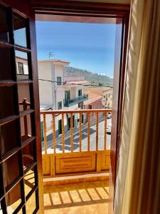 una vista desde una ventana de un balcón en Alma In the heart of the Vilaflor! Self check in 24h, en Vilaflor