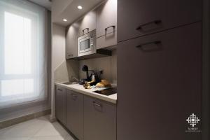 Küche/Küchenzeile in der Unterkunft Matteotti Luxury Residence