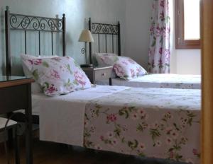 Postel nebo postele na pokoji v ubytování Villa Ermis