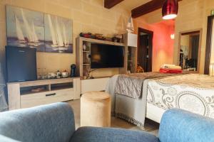 Гостиная зона в Ajuga Luxury Boutique B&B