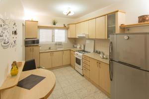 Küche/Küchenzeile in der Unterkunft Sunlight Holiday Apartment