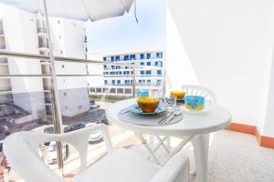 A balcony or terrace at RNET - Weekend Roses