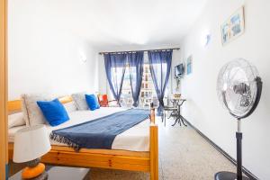 A bed or beds in a room at RNET - Weekend Roses