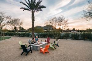 people sitting on a park bench at Andaz Scottsdale Resort & Bungalows in Scottsdale