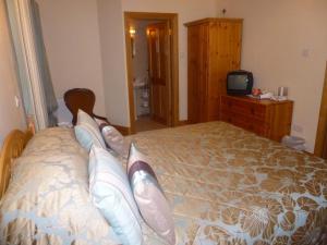 Letto o letti in una camera di Ben View Guesthouse