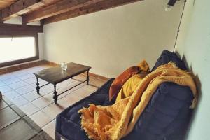 Posezení v ubytování La casa de la abuela Amalia