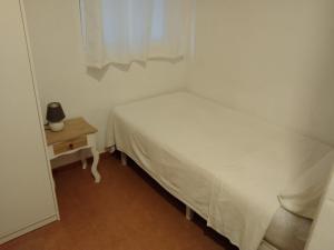 Postel nebo postele na pokoji v ubytování Joy Beach B&B