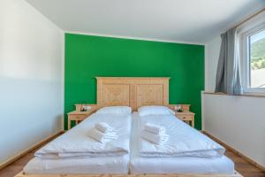 Posteľ alebo postele v izbe v ubytovaní Anblick Appartement with lake view