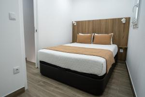 Postel nebo postele na pokoji v ubytování Casas da Barca