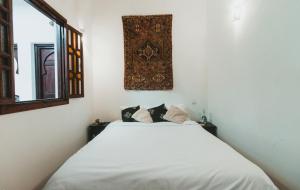 Voodi või voodid majutusasutuse Noqta Space Coworking Coliving Space toas