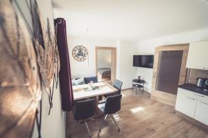 Kuchyň nebo kuchyňský kout v ubytování Apartments z‘Haus + 14 fotografií