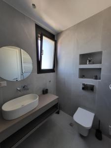 Kúpeľňa v ubytovaní Olea Valley Holiday Villa